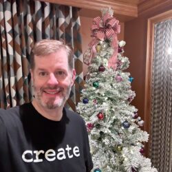 Million Sales Retreat - Day 2 Christmas Kits party - Brian in the decorated room