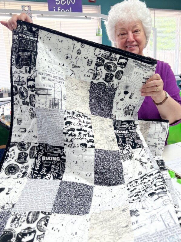Marilyn at Marietta Quilts, Mom's finished quilt, Brian King