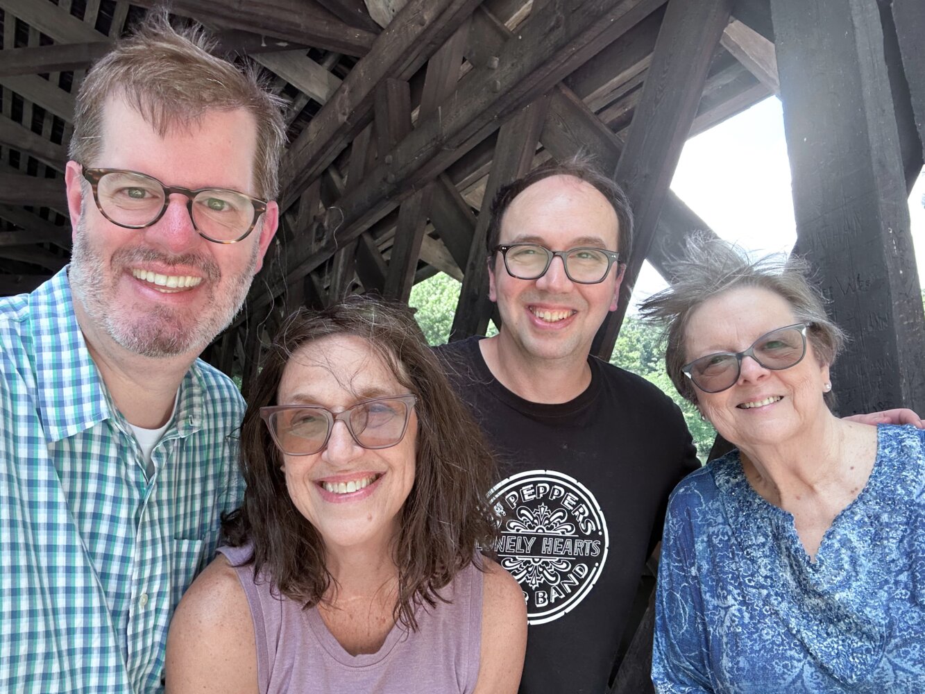 Family at Covered Bridge in Stone Mountain Park Family at Covered Bridge in Stone Mountain Park